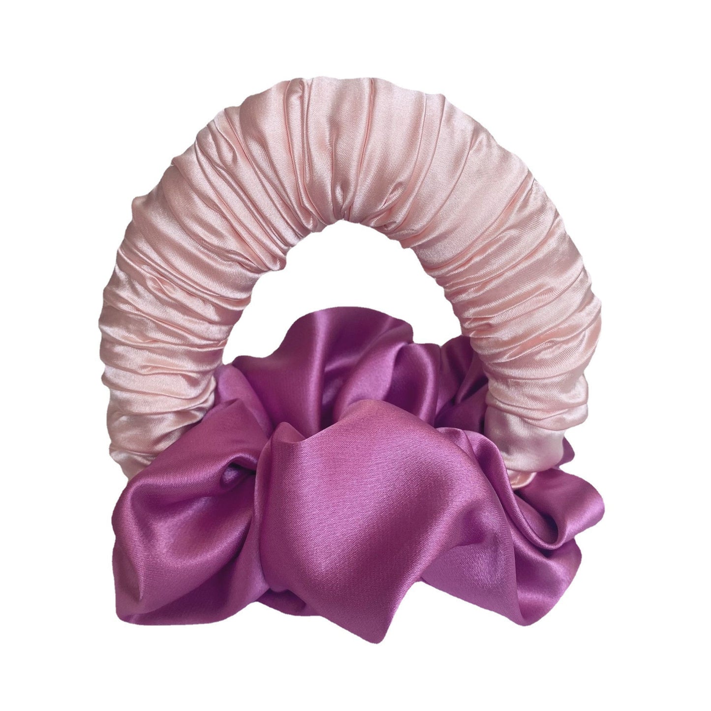 Purple satin hair tie with a pink scrunchie on a white background