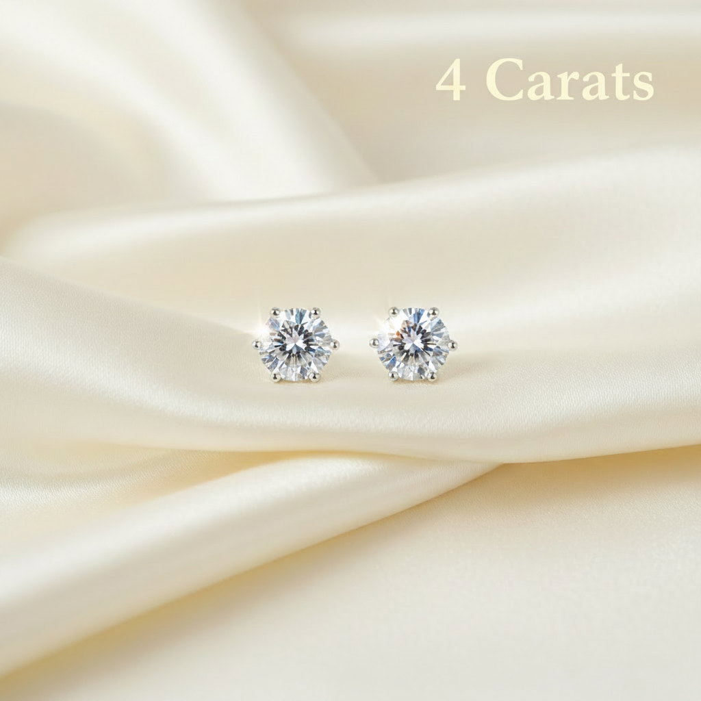 4 carat stud earrings flat lay on cream satin