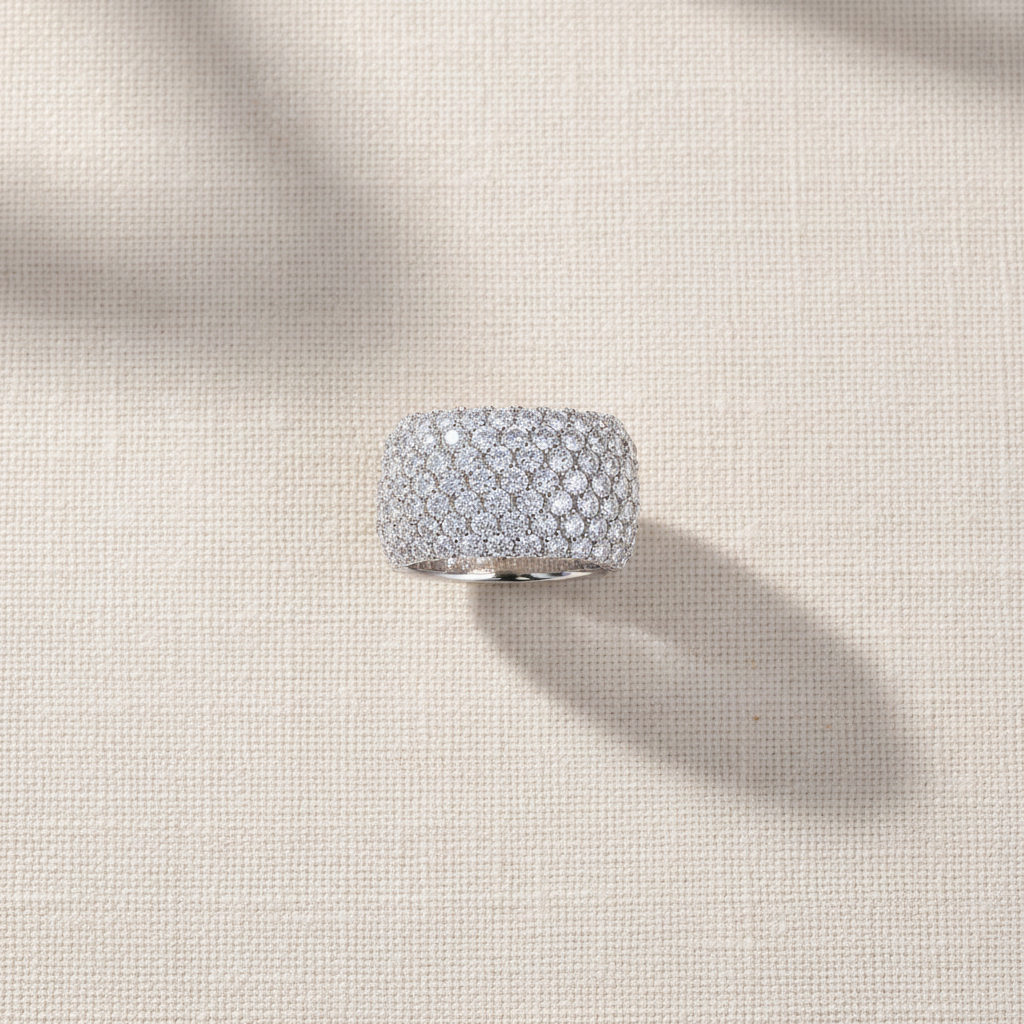 Pavé ring flat lay - quiet luxury