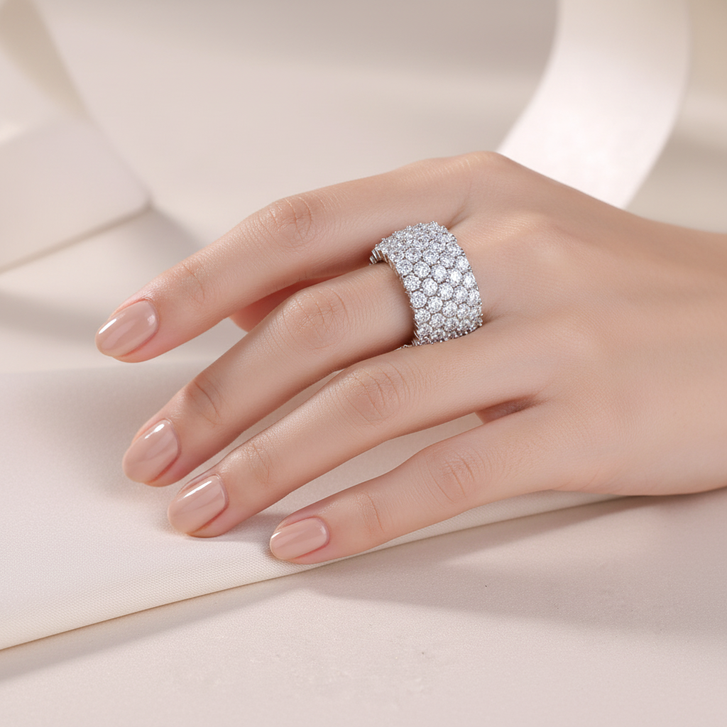 Pavé ring on model hand - quiet luxury
